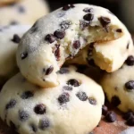 Chocolate chip cheesecake cookies cooling on a rack