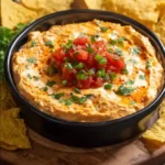 Cream Cheese Salsa Dip served in a bowl with tortilla chips on the side