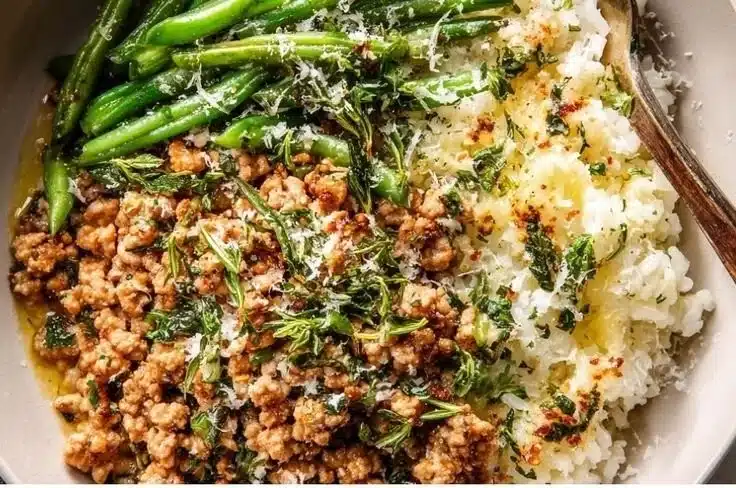 Garlic Butter Ground Turkey Rice Bowl with vegetables in a serving dish