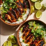 Sweet Chili Chicken Bowl with Coconut Lime Drizzle served in a bowl.