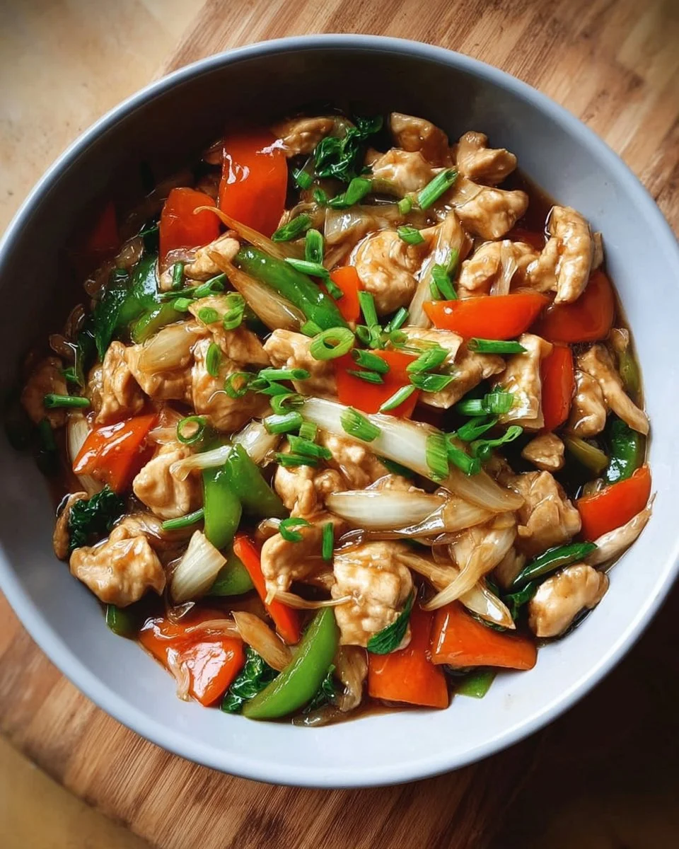Delicious Chicken Chop Suey with colorful vegetables and tender chicken pieces
