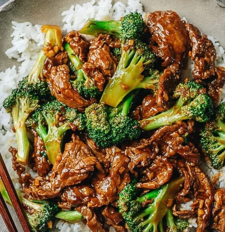 Delicious plate of Chinese Beef and Broccoli served with rice