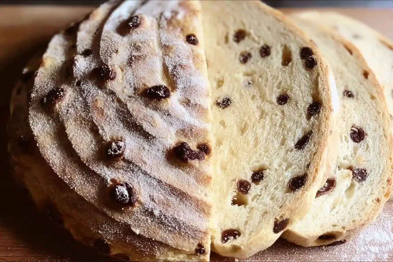 Freshly baked chocolate chip sourdough bread slice with melty chocolate chips