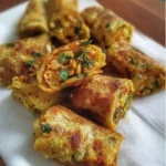 Delicious Schezwan Vegetable Roti Roll with vibrant vegetables and spicy sauce