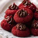 Delicious Hershey's Red Velvet Blossoms cookies on a plate.