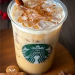 Starbucks Iced Gingerbread Chai Tea Latte with festive spices and ice