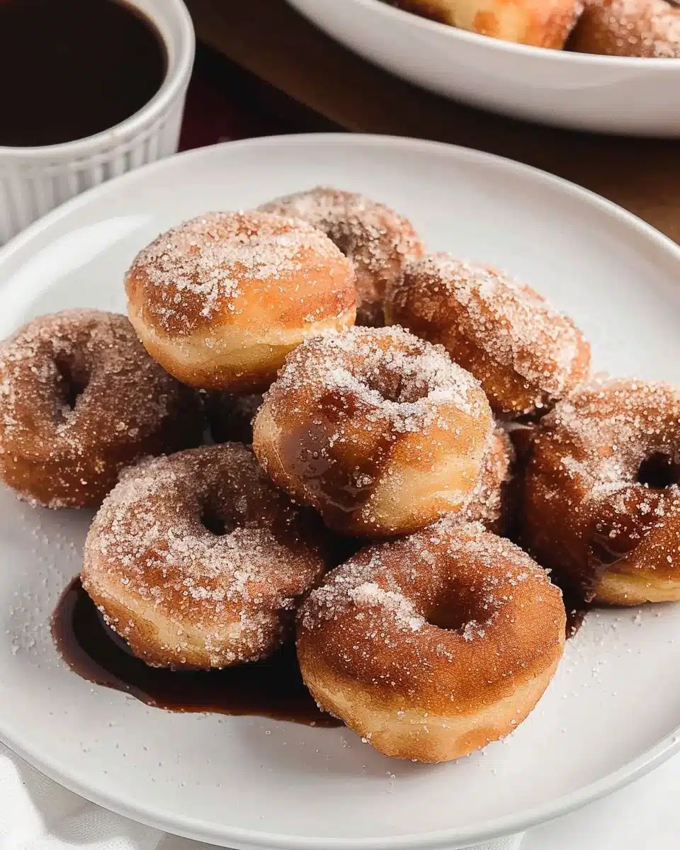 Delicious air fryer donut holes served with sugar coating.