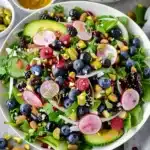 Blueberry Pistachio Spring Salad with vibrant colors and fresh ingredients