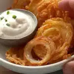 Crispy onion ring chips in a bowl ready to be enjoyed as a tasty snack