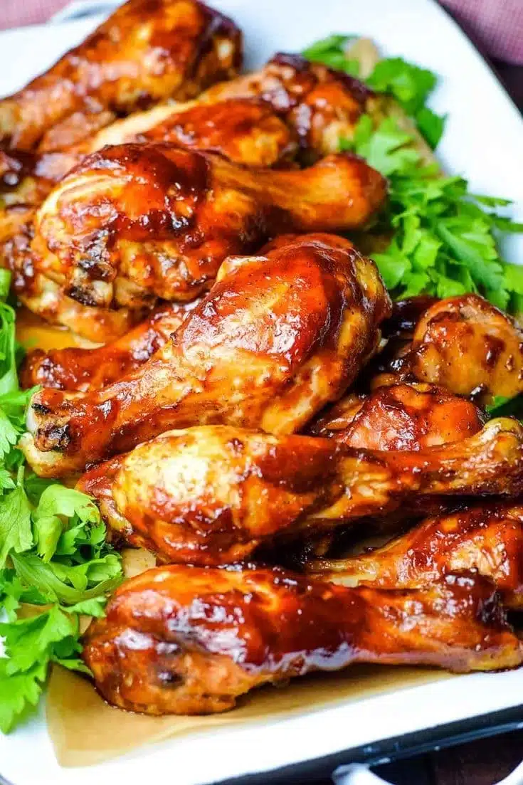 Delicious BBQ chicken legs cooked in the oven, seasoned and ready to serve.