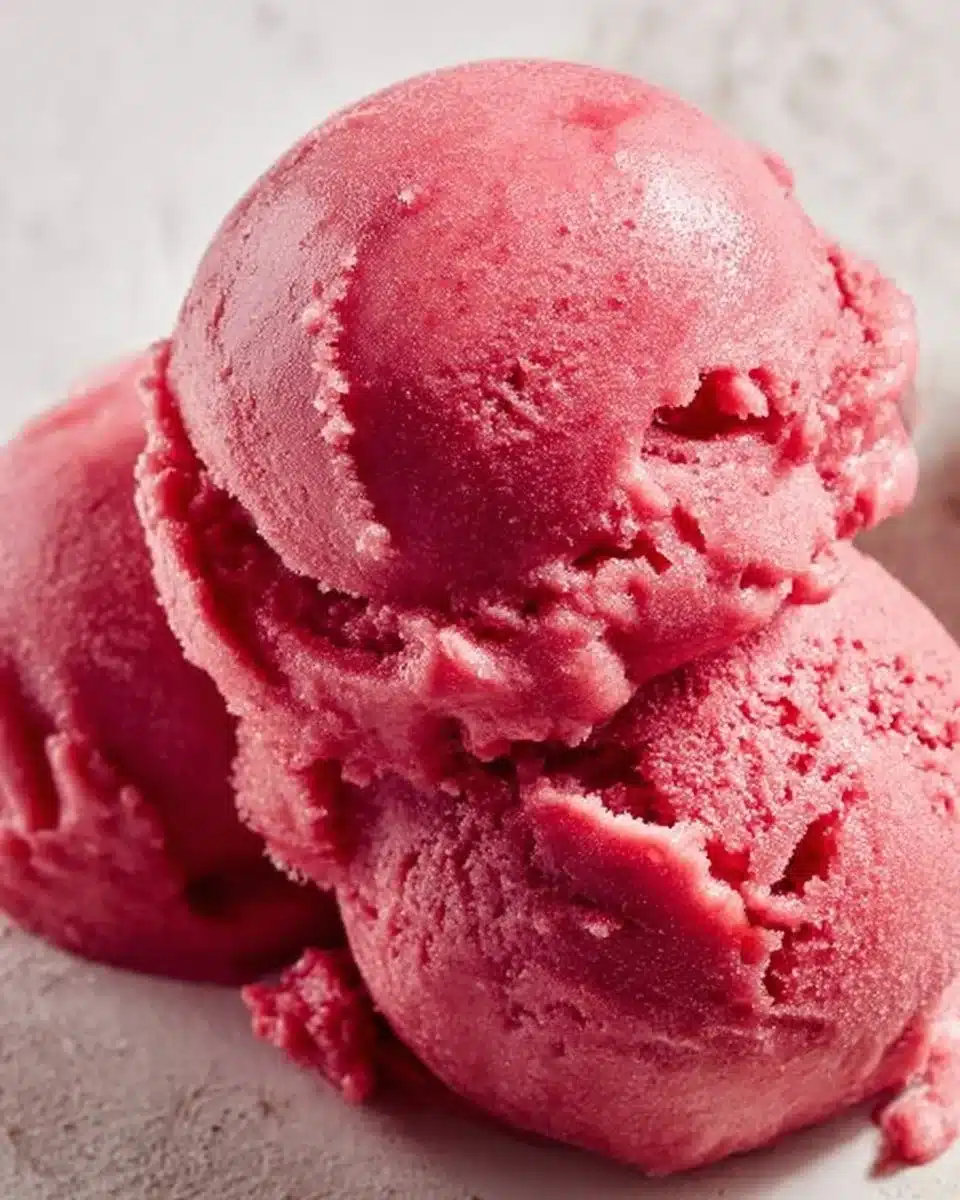 Delicious cherry sorbet made from fresh cherries served in a bowl.