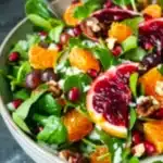 Colorful Christmas Salad with fresh ingredients served in a festive bowl
