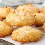 Delicious homemade coconut cookies on a baking tray