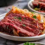 Slow cooker Guinness-braised corned beef served with vegetables