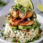 Honey Lime Chicken and Avocado Rice Stack plated beautifully.