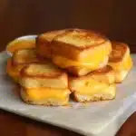 Mini Grilled Cheese Hawaiian Rolls served on a platter