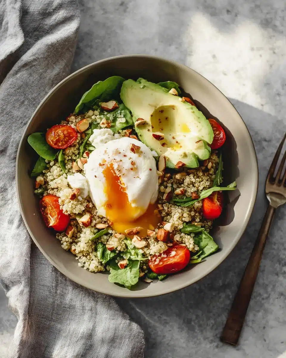 Delicious poached egg breakfast bowl with greens and toast