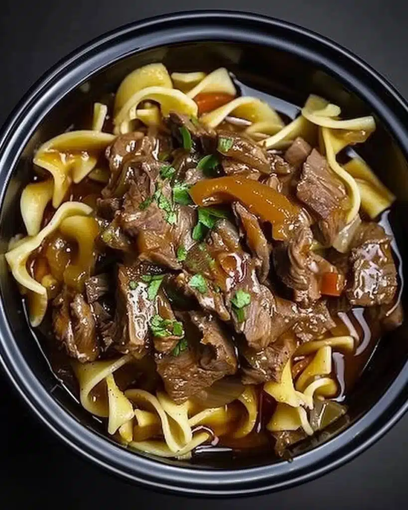 Slow Cooker Beef and Noodles dish served in a bowl