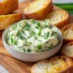 Delicious homemade whipped garlic scapes butter spread on bread