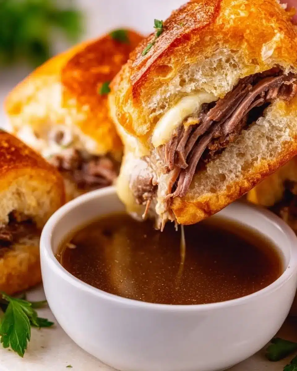 French Dip Sliders served with au jus for dipping