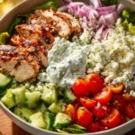 Greek Chicken Bowl with fresh vegetables and flavorful toppings