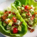 Delicious BLT chicken salad lettuce wraps ready to enjoy