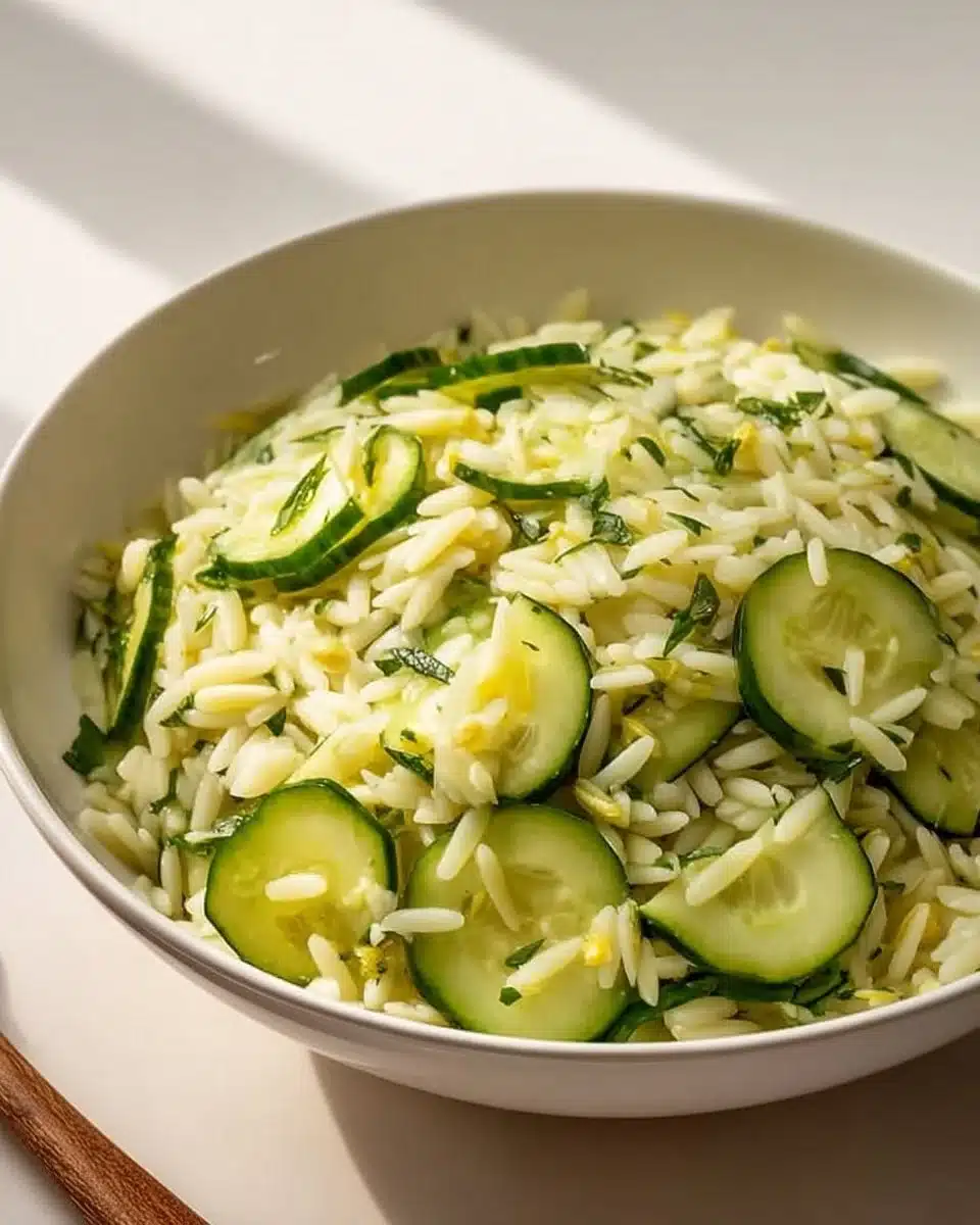 Zesty cucumber lemon orzo salad with fresh vegetables and a lemon dressing