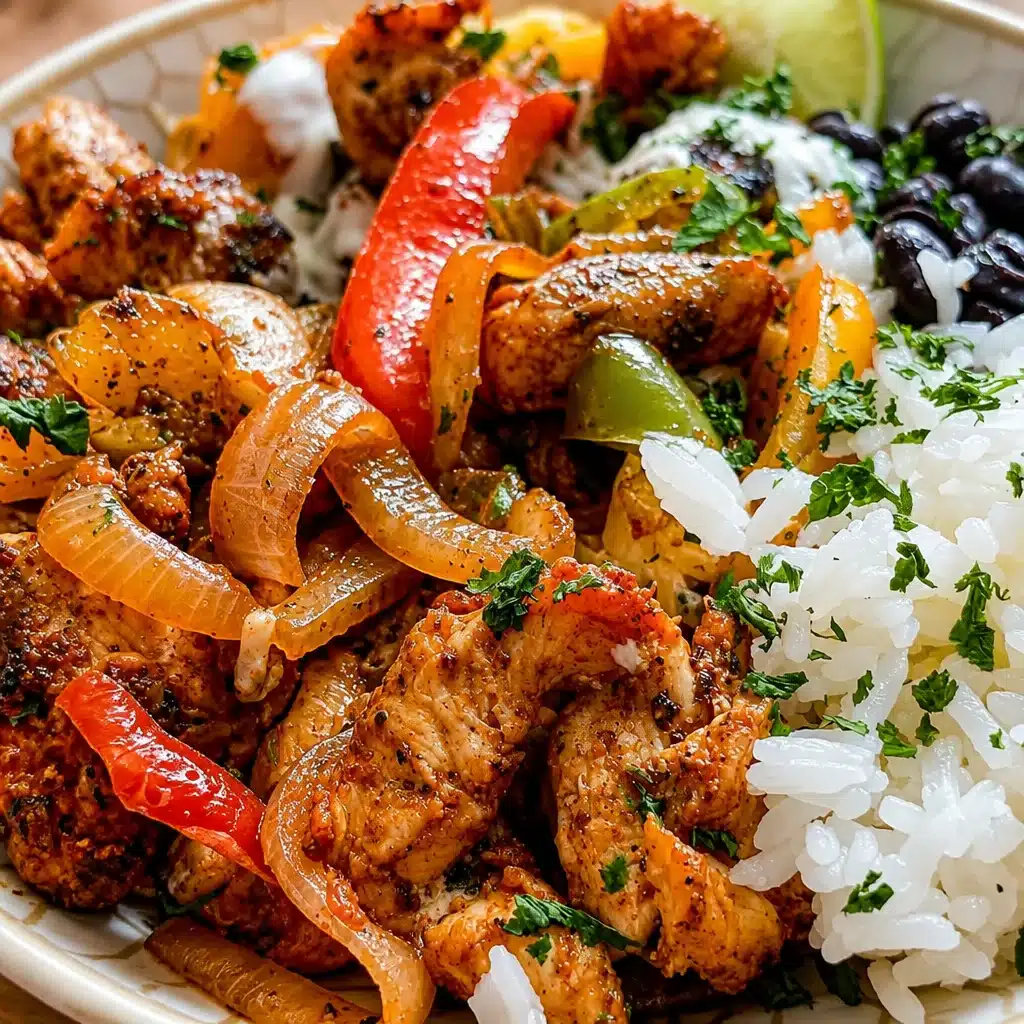 Delicious Chicken Fajita Bowl with seasoned chicken, peppers, rice, and avocado crema.