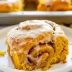 Delicious pumpkin cinnamon rolls topped with cream cheese icing